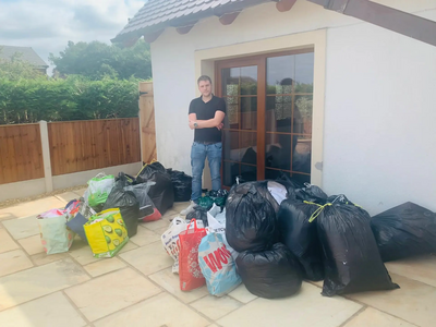 Team member Stuart with some of the collected items for Afghan refugees